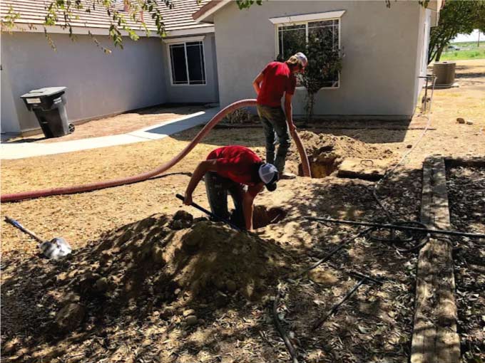 24/7 plumbers working on a bakersfield home