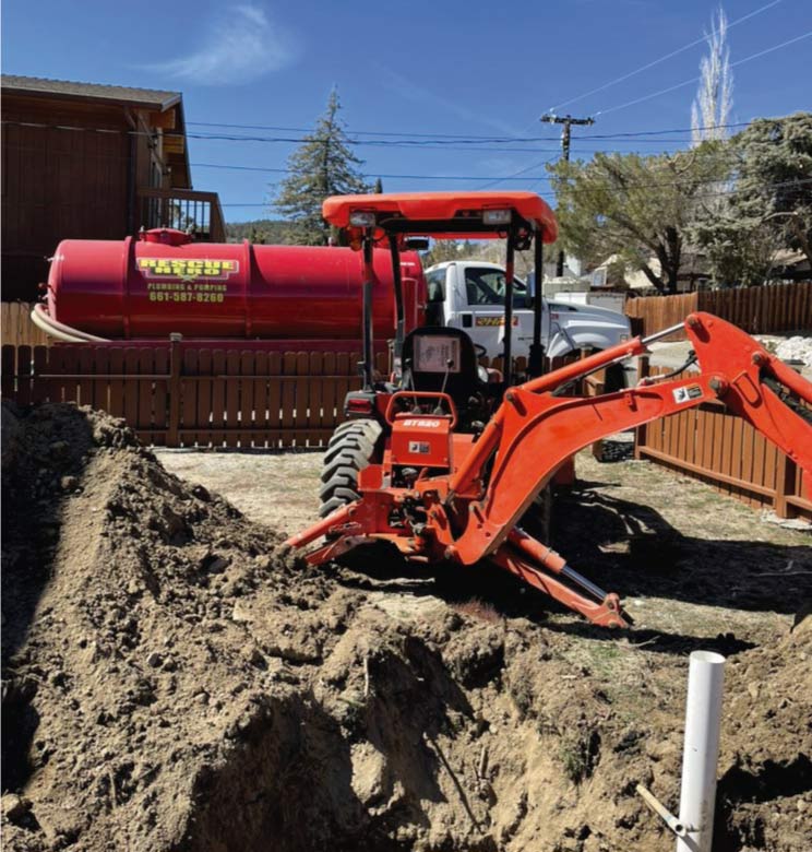 Family-owned plumber performing a complex sewer line repair in bakersfield