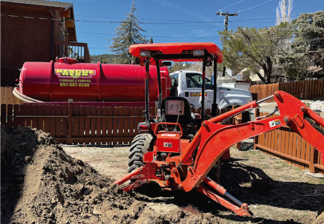 water-damage-repair plumbing truck and local plumbers in bakersfield ready to perform a sewer line replacement in bakersifled, ca
