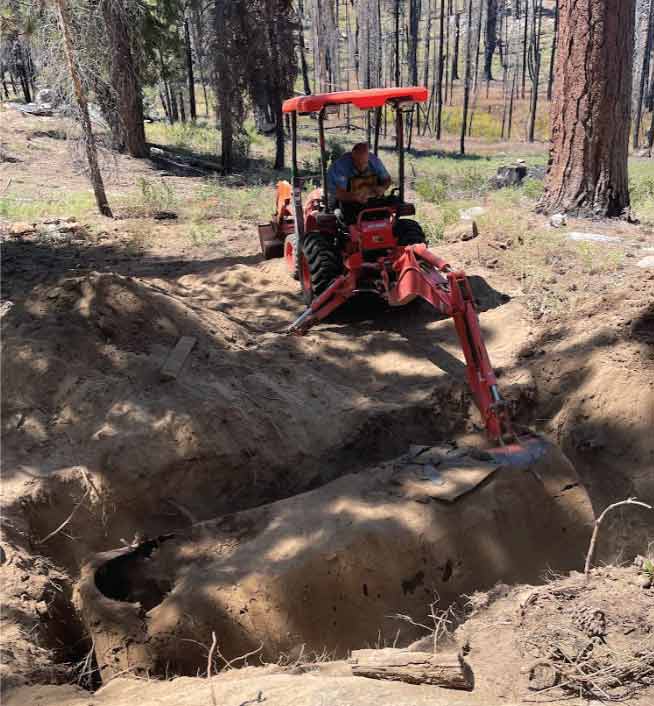 Licensed plumber's truck responding to plumbing emergency in Bakersfield, California.