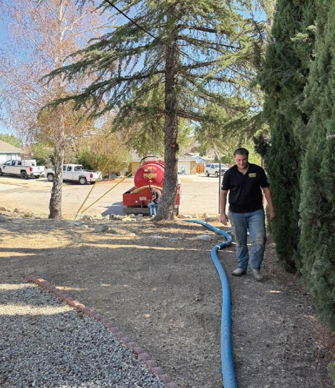 septic-tank-cleaning-bakersfield A septic tank truck performs septic tank certification and inspection for a homeowner selling their property in Tehachapi, CA.