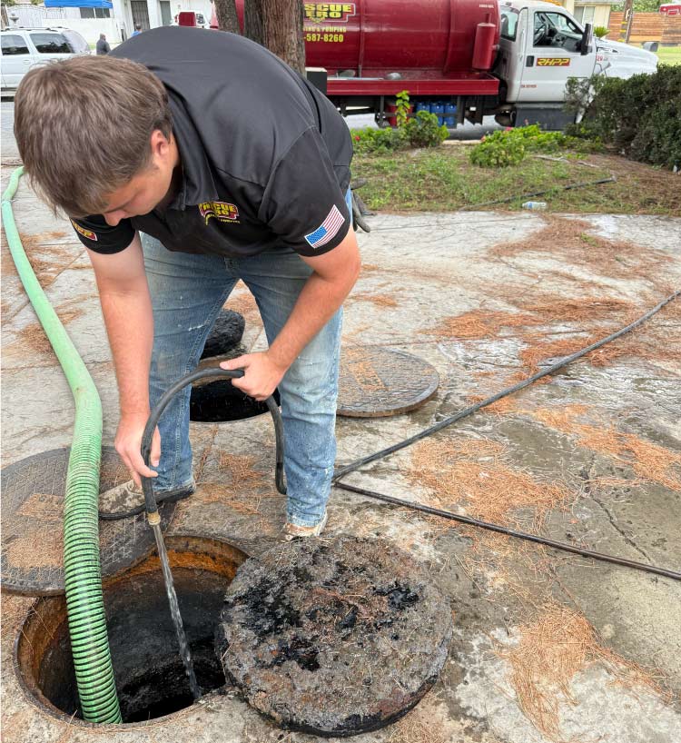 Rescue Hero Plumbing technician servicing a home septic system,