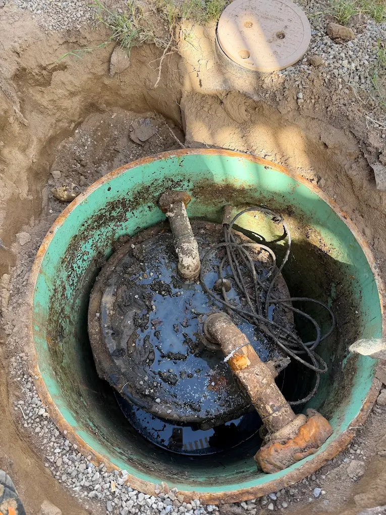 Submersible sewage ejector pump or heavy-duty sump pump mechanism ready for professional installation.
